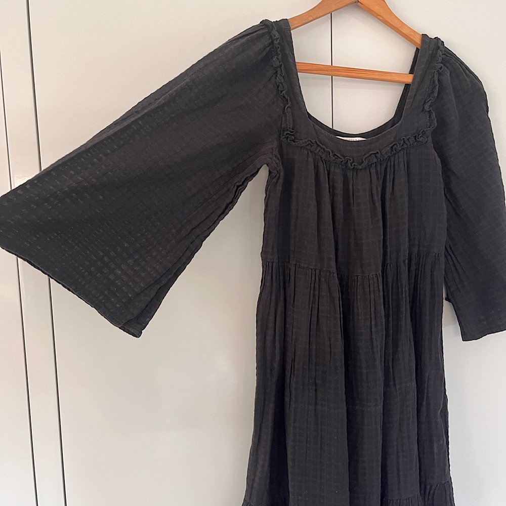 Lovely Christy Dawn black sheer waffle dress with tie back and ruffle detail.